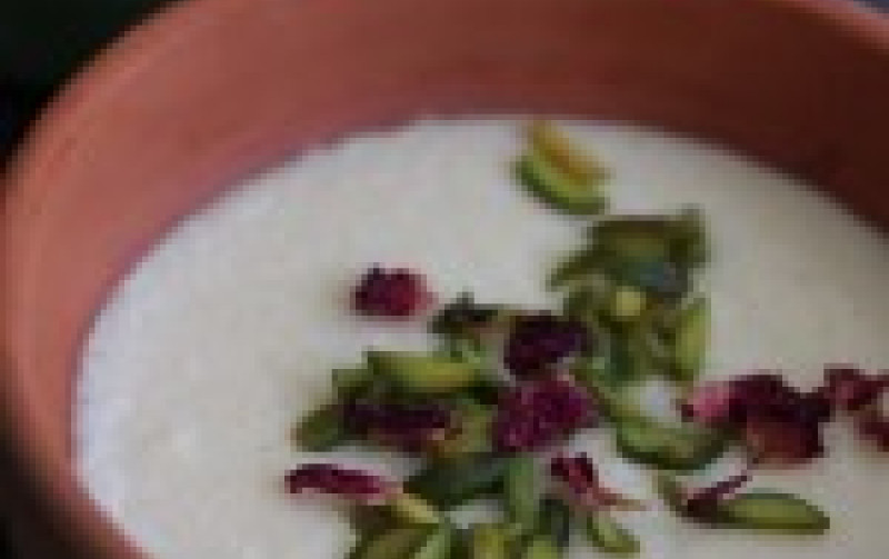 Firni ground rice pudding  Recipe with apple compote and rose petals