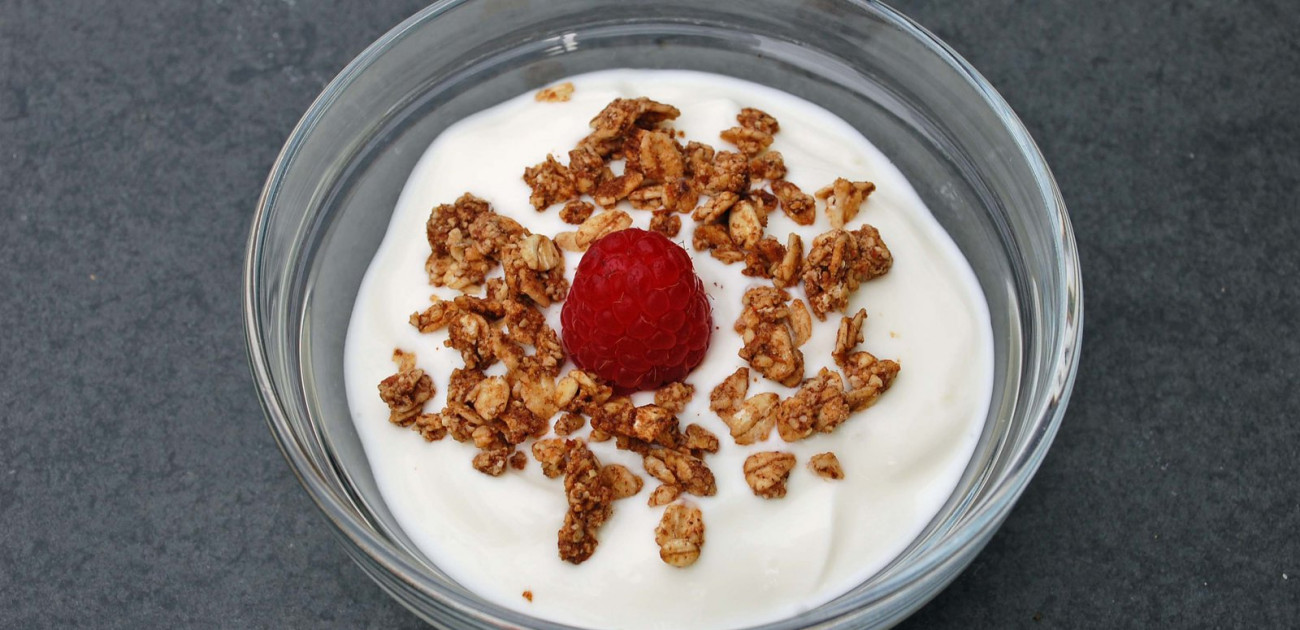 Yoghurt, Raspberries With Granola For Breakfast