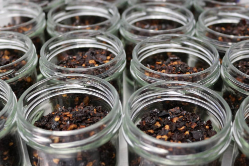 The classic smokey and mild Mexican chilli - Chilli Chilpotle being packed at the Steenbergs UK spice factory.