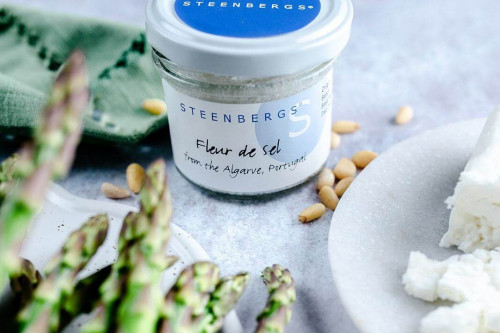 Steenbergs Fleur De Sel, flaky sea salt, sun dried in the Algarve and packed in glass.
