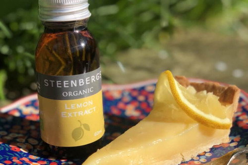 Steenbergs Organic Lemon Extract 60ml, glass bottle, from the Steenbergs UK online shop for organic baking extracts and ingredients.