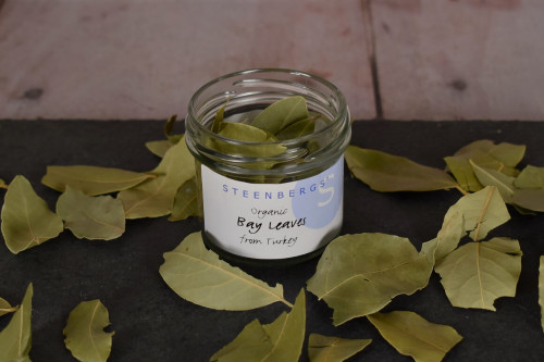 Steenbergs Organic Bay Leaves Dried in a reusable or recyclable glass jar, available at the UK Steenbergs online shop for herbs and spices.