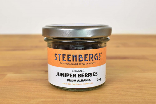 Steenbergs Organic Juniper Berries in reusable or recycable glass jar from the UK Steenbergs online shop for herbs and spices.