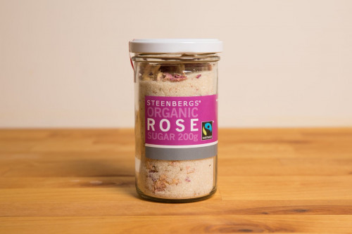 Steenbergs Organic Fairtrade Rose Sugar Glass Jar from the Steenbergs UK online shop for organic, Fairtrade and ethical flavoured sugars and baking ingredients.